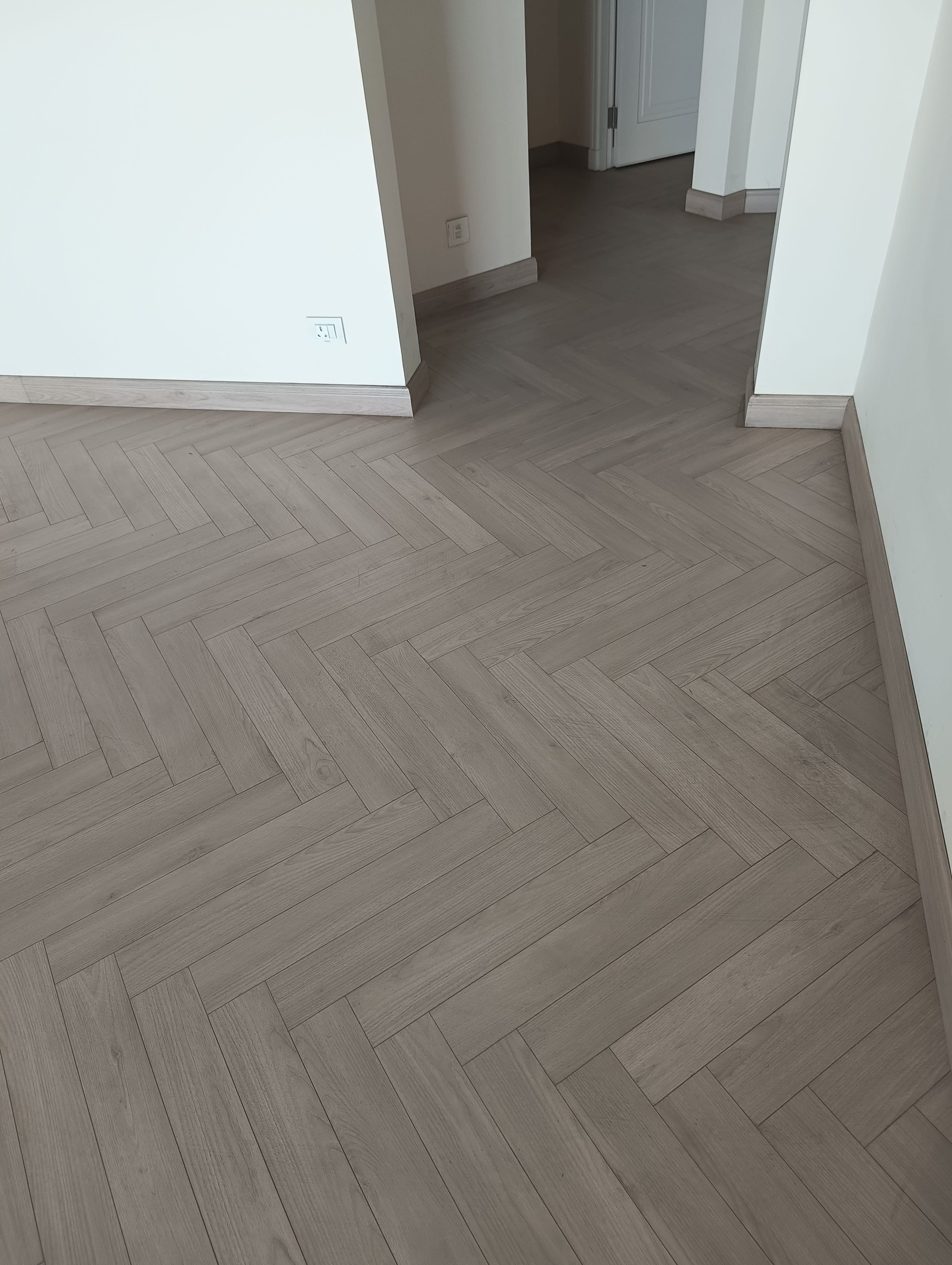 Modern Grey Color Herringbone Flooring Installed Design